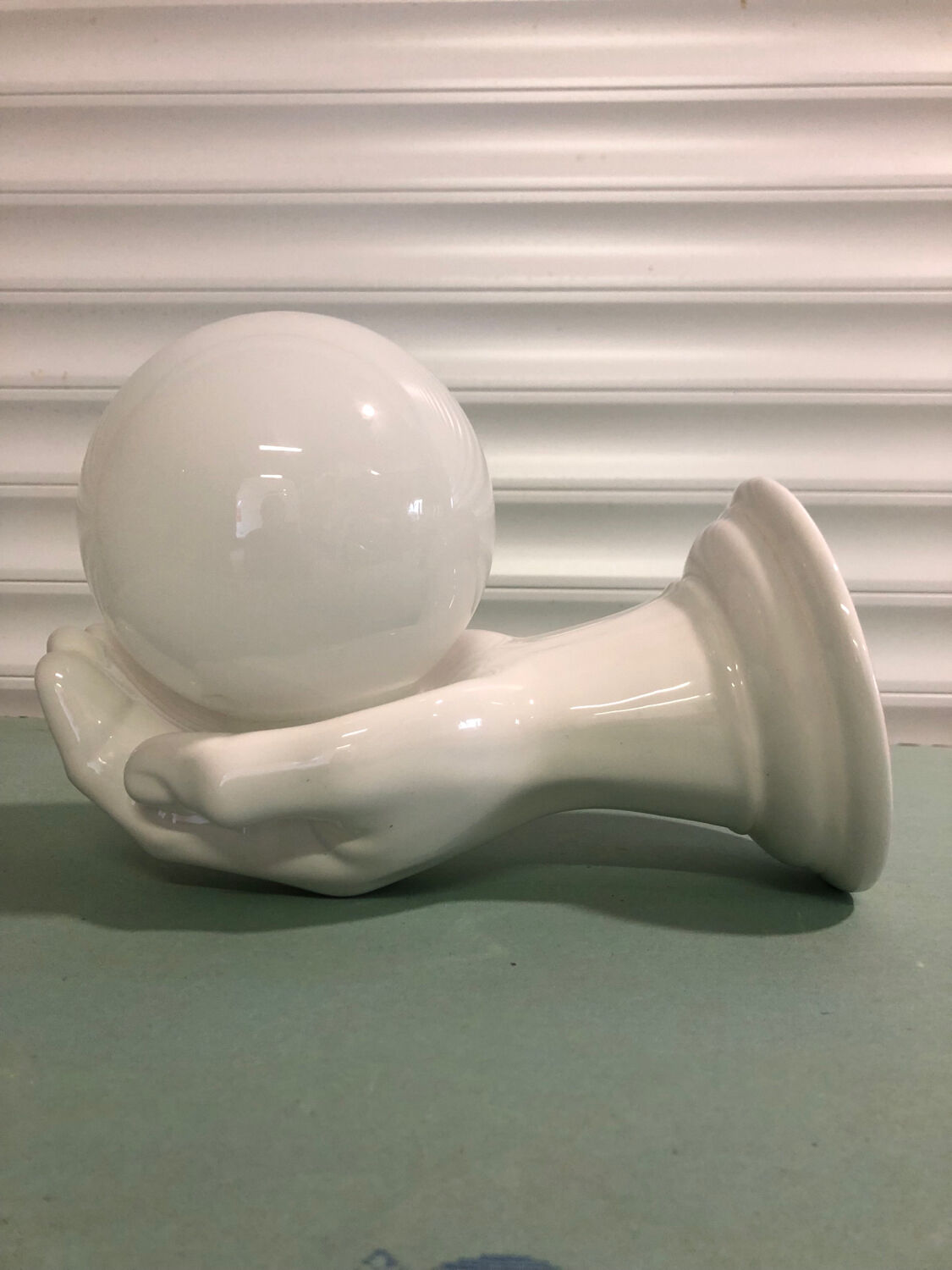 Ceramic hand wall lamp