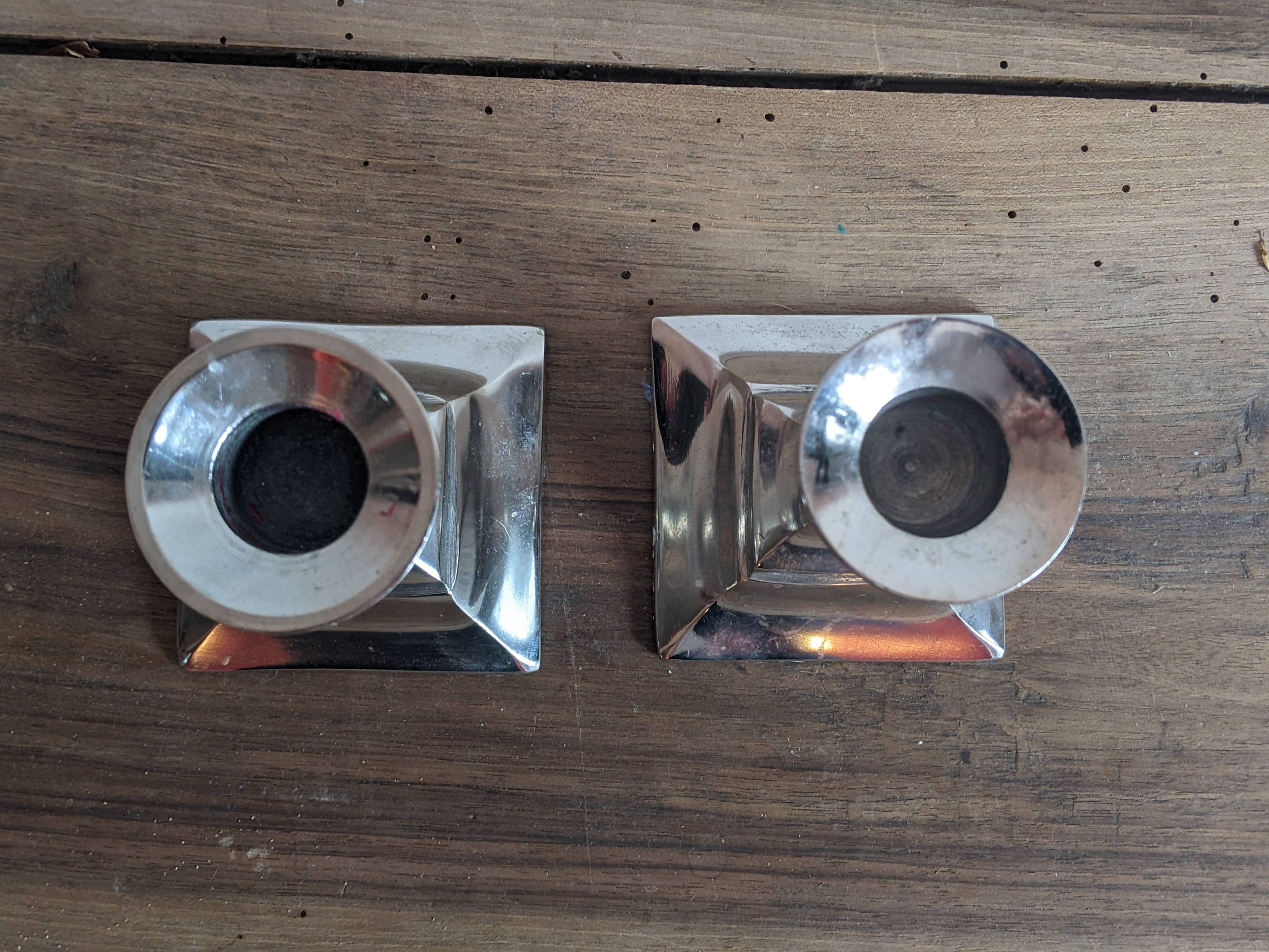 Pair of silver metal candlesticks