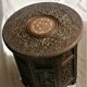 Ancient oriental pedestal table in carved wood