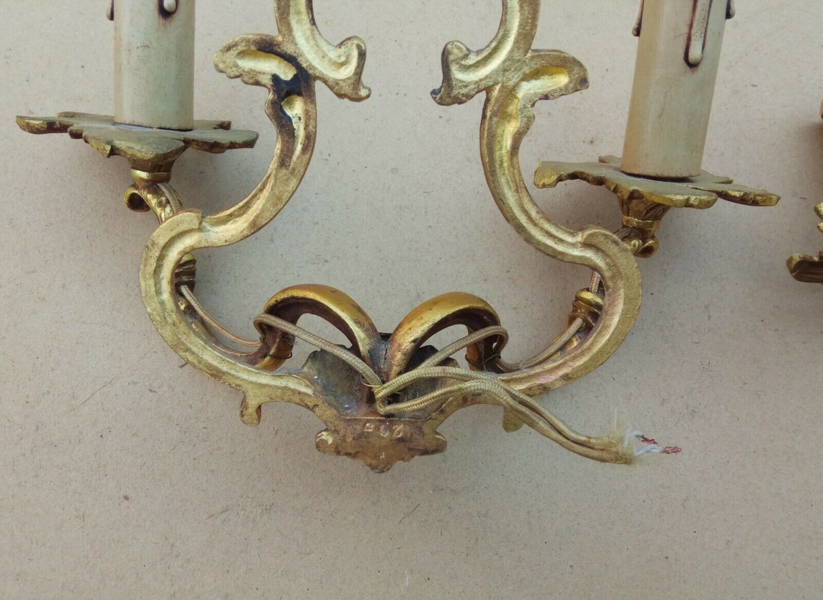 Pair of Louis XV style bronze cage wall lamps