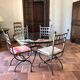Wrought iron and glass table 4 chairs