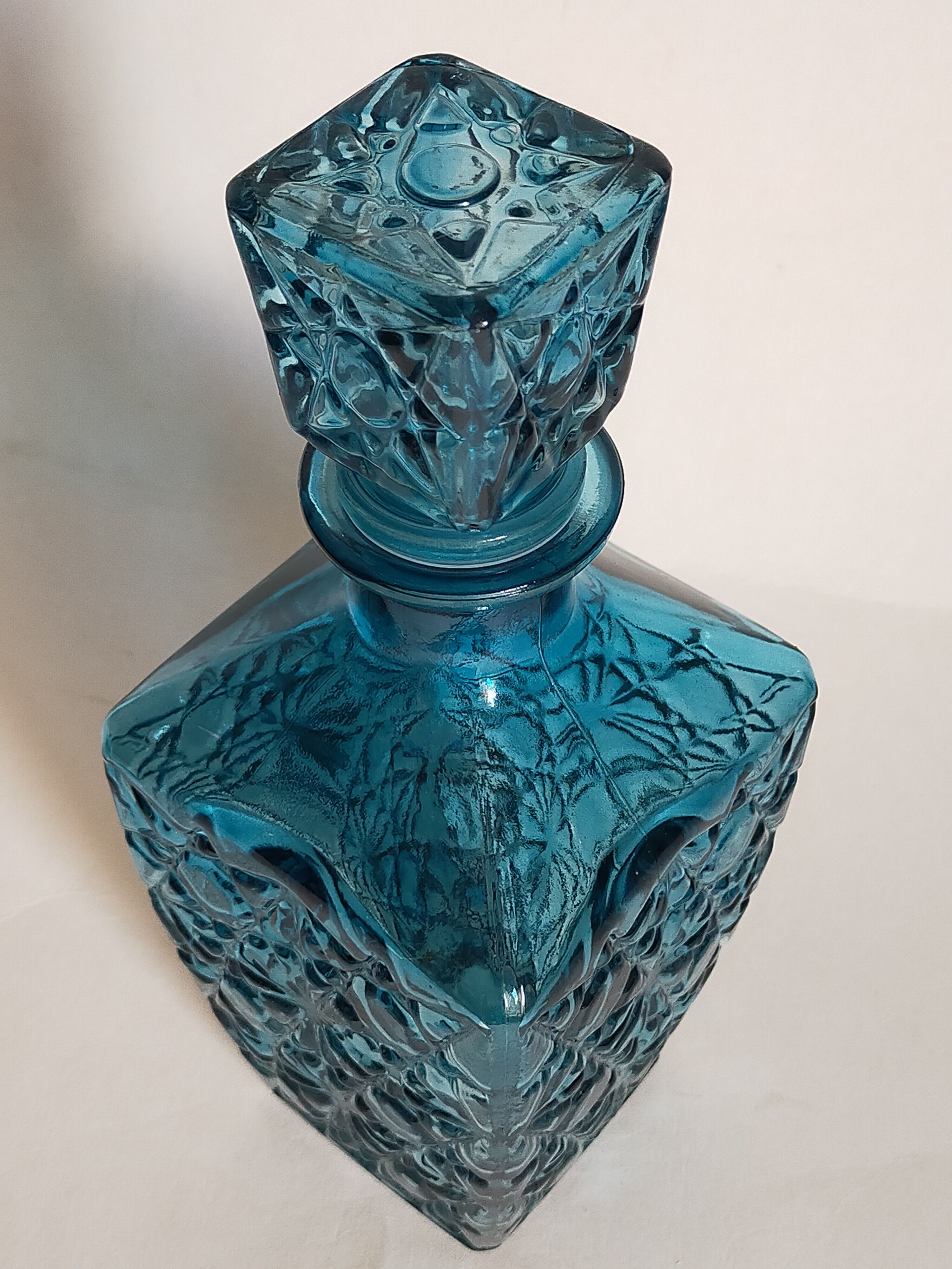 Vintage blue glass whiskey decanter