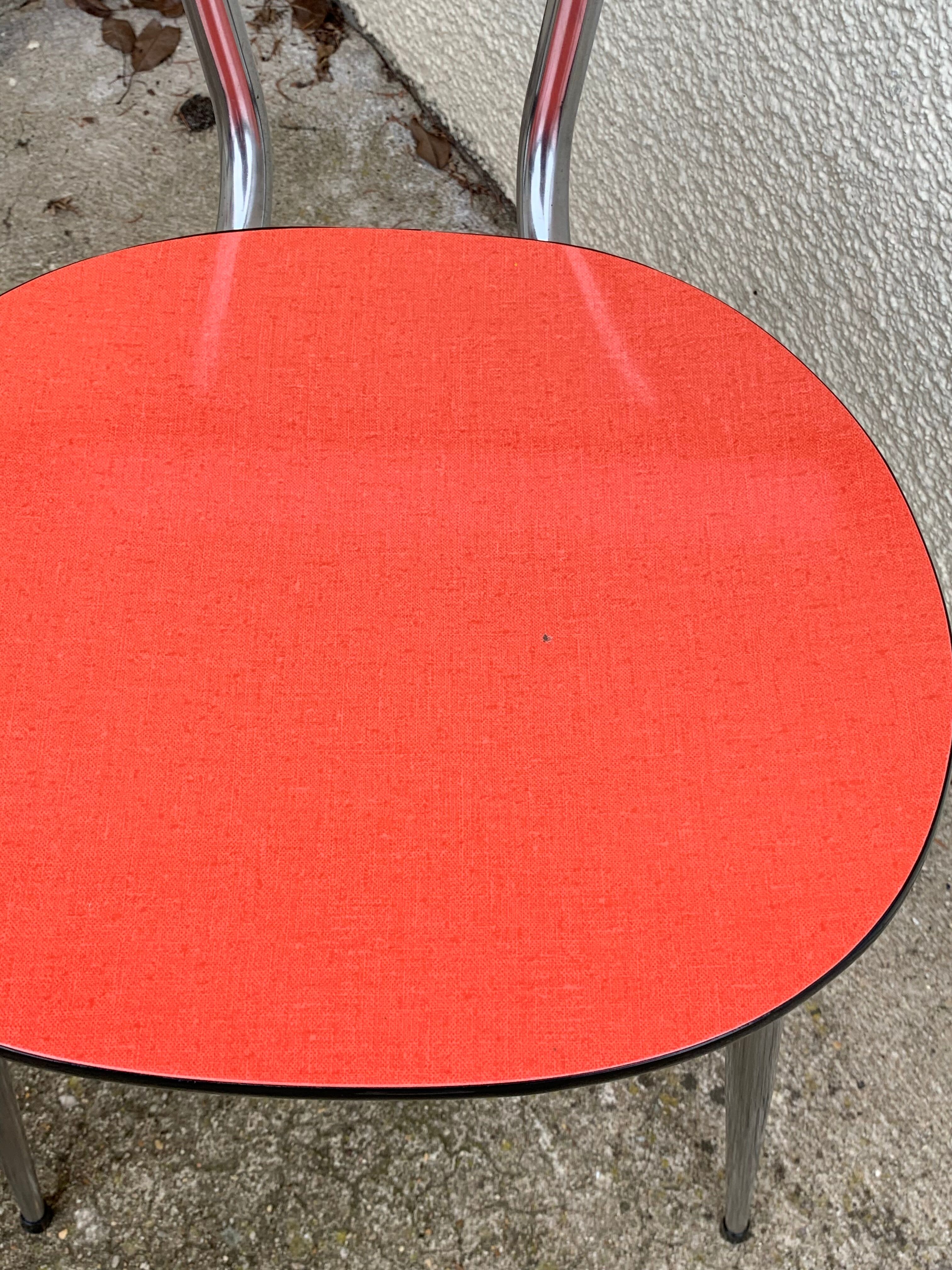 Red formica chairs 1950