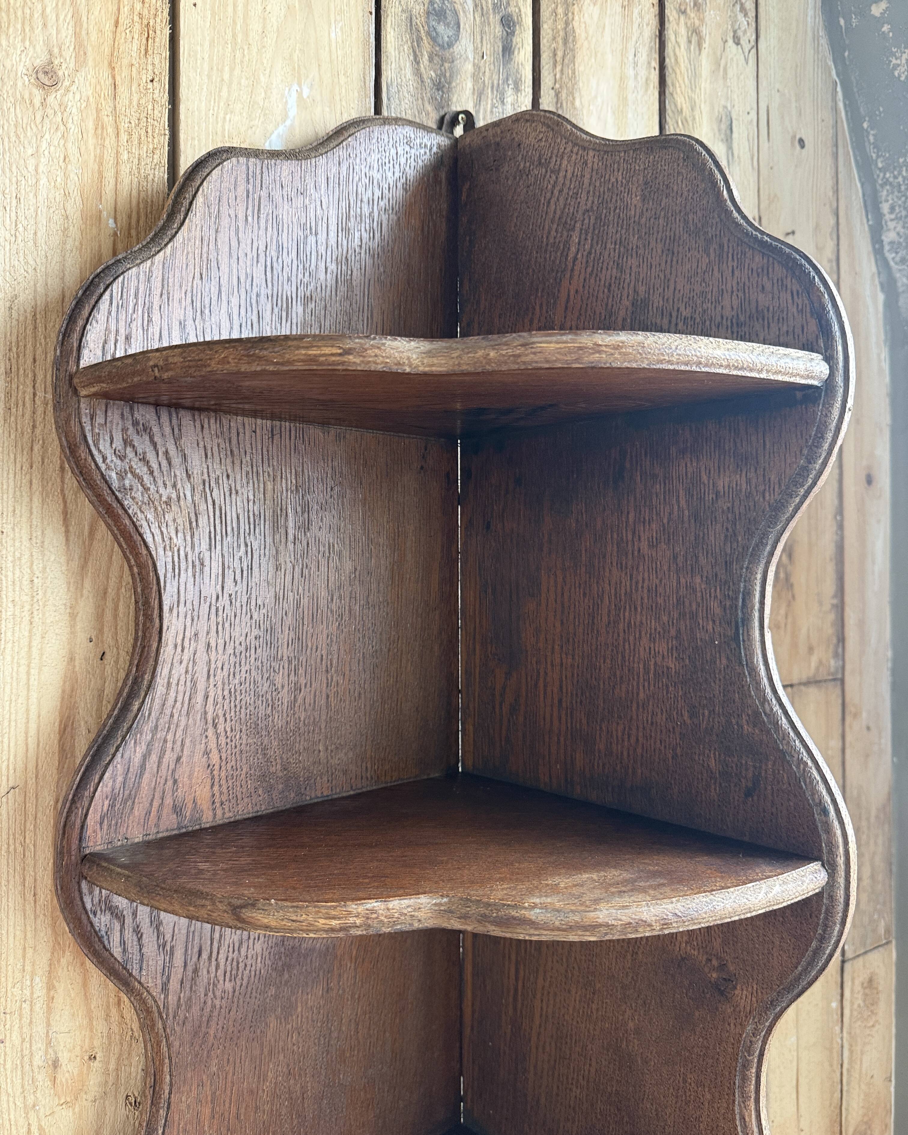 Old corner shelf in solid oak