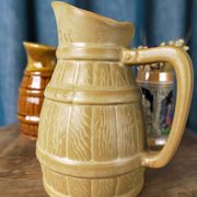 Two pitchers and a small original king beer mug