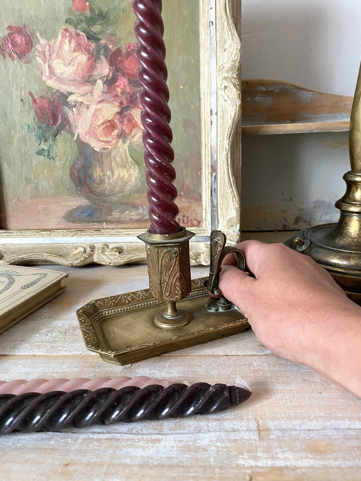 Antique brass thumb candle holder