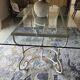 Wrought iron table by Roche Bobois, with a glass top.