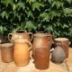 Old stoneware pot with lid