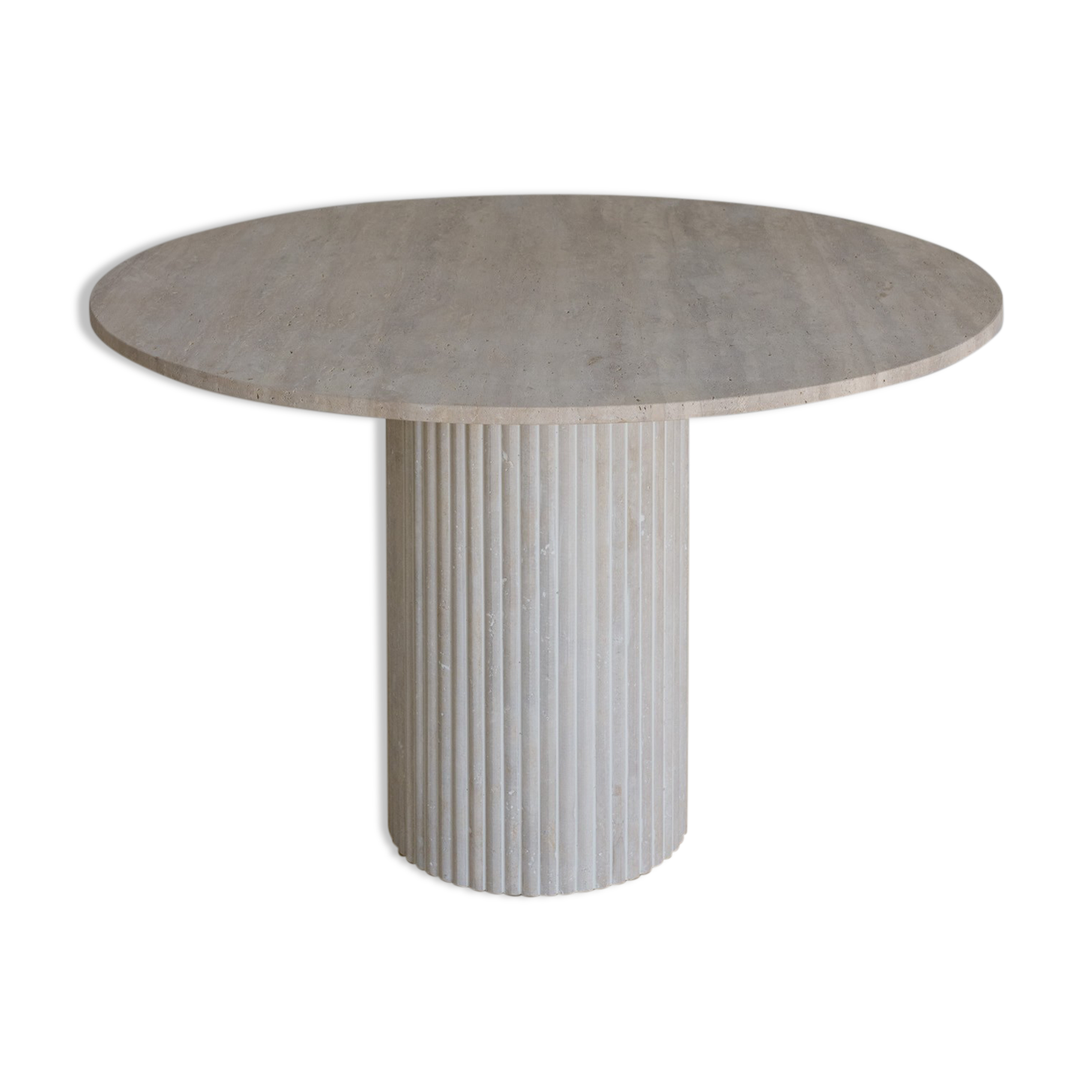 Omega circular dining table in natural travertine