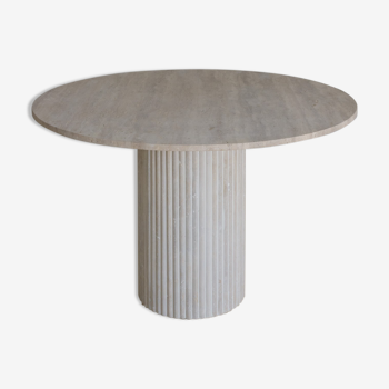 Omega circular dining table in natural travertine