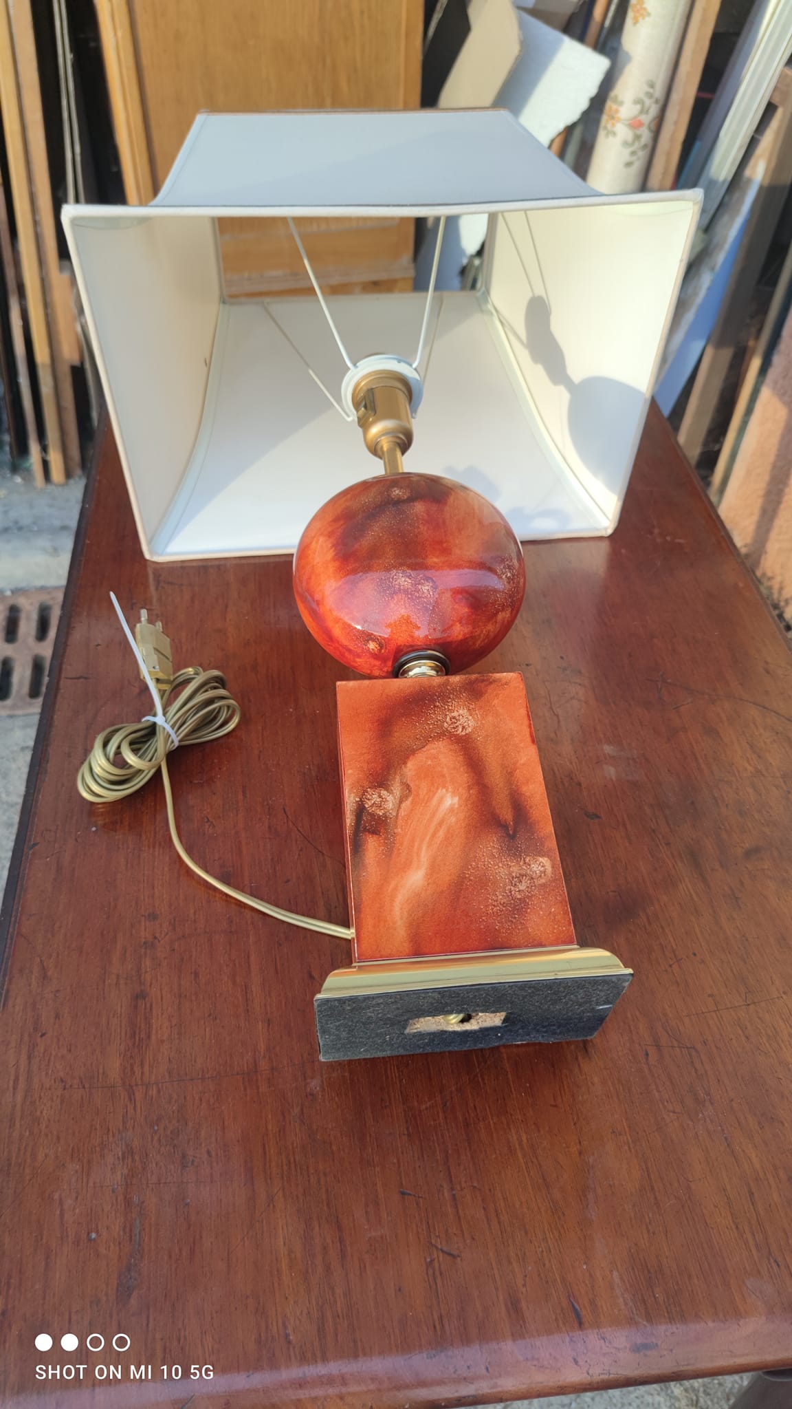 Lamp circa 1970 in iron and lacquered wood as well as bronze