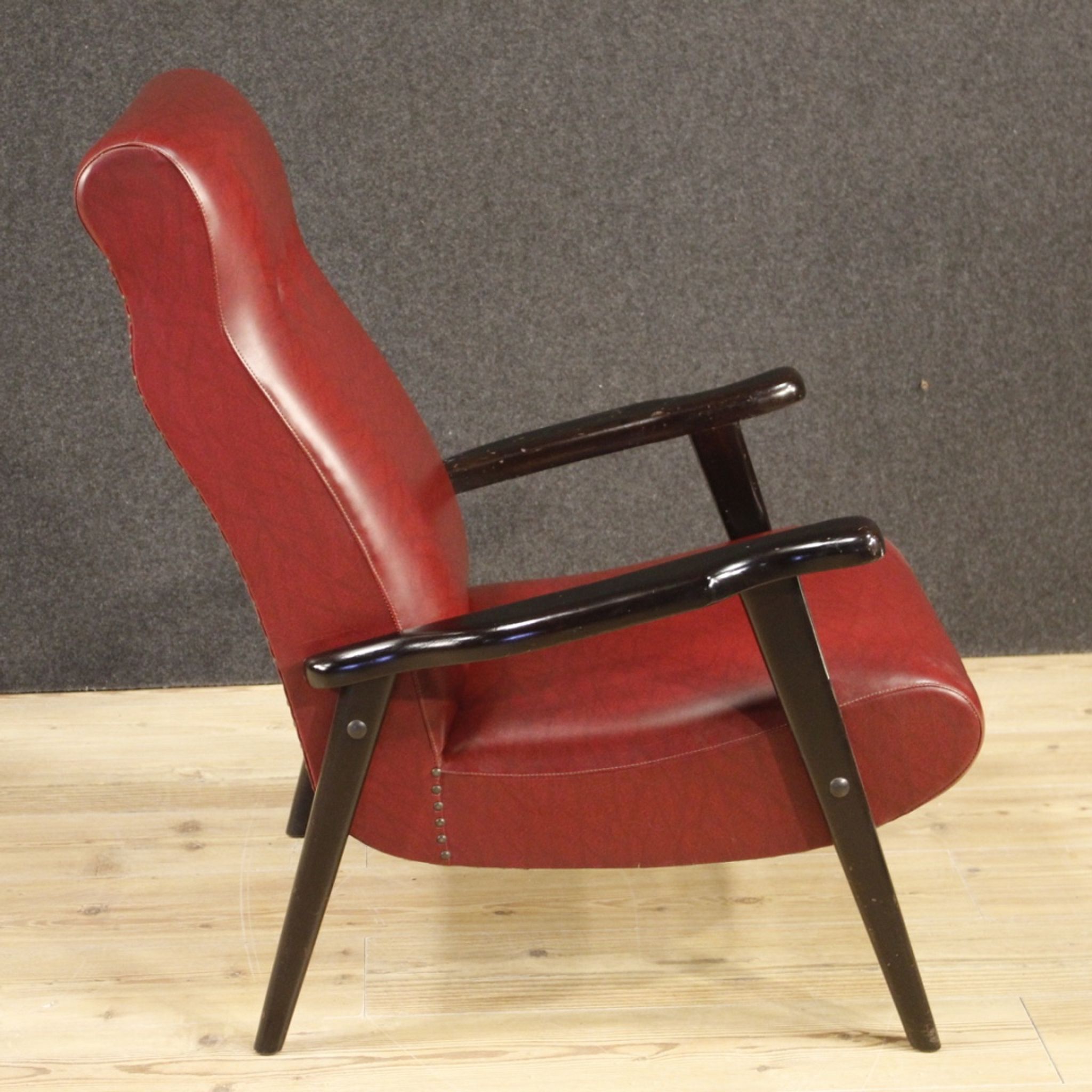 Italian design armchair in red faux leather from the 70s