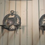 Pair of carved metal wall lamps signed RG