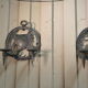 Paire d’appliques en métal sculpté signées RG