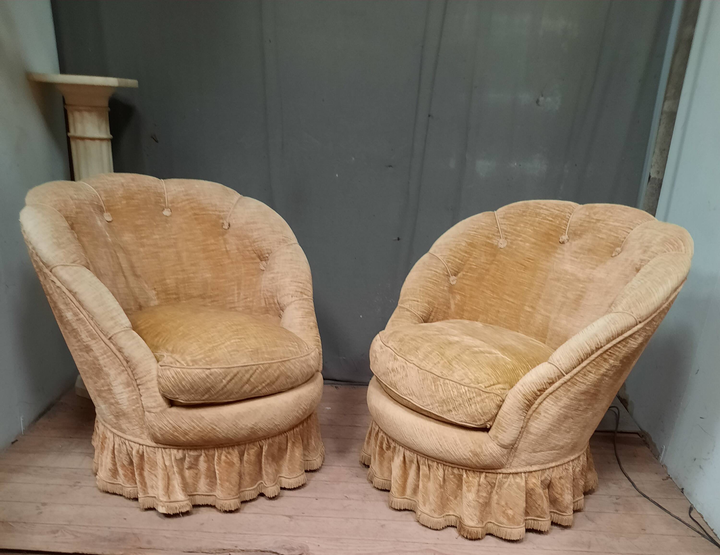 Pair of flared back toad armchairs