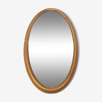 Miroir oval doré