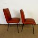 Pair of chairs in orange skaï