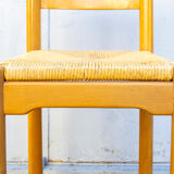 Four wooden and straw stools 70
