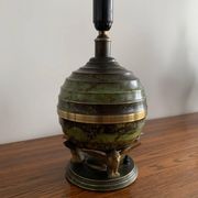 Art Deco table lamp in patinated bronze with eagles holding a globe, France 1940.