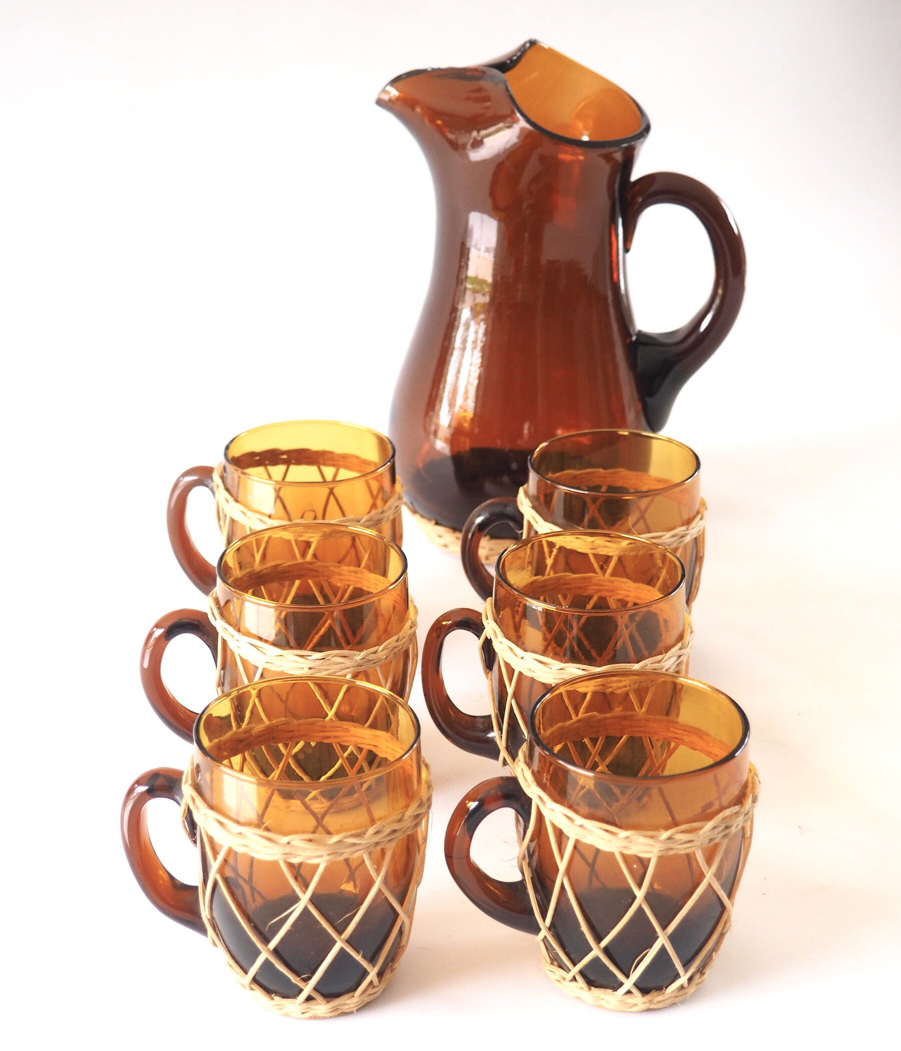 Amber glass and rattan service