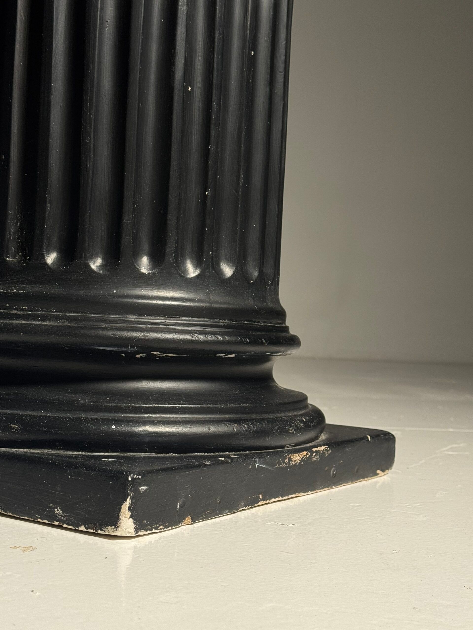 Neoclassical black plaster column