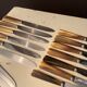 Coffret 24 couteaux en inox et bakelite