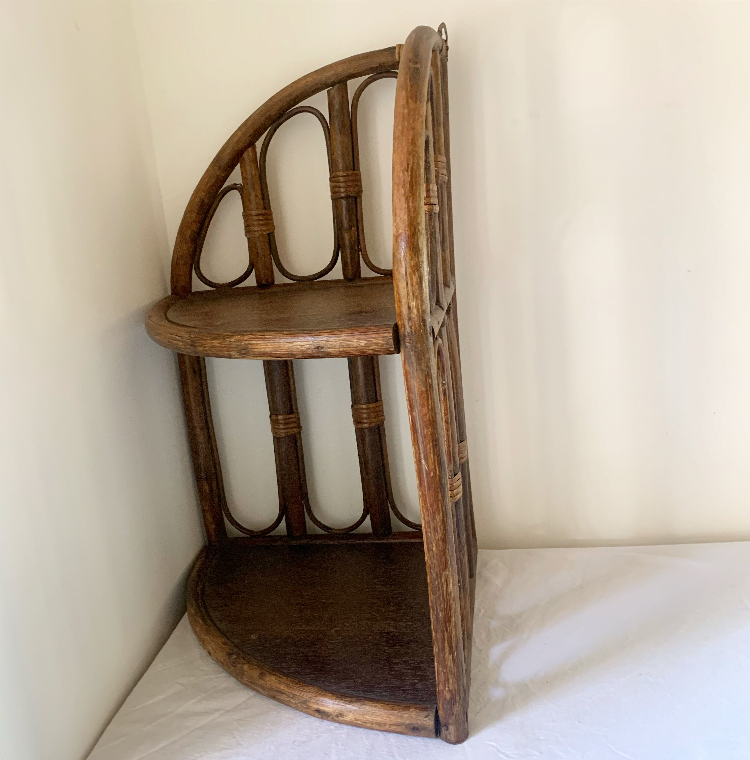 Rattan corner shelf