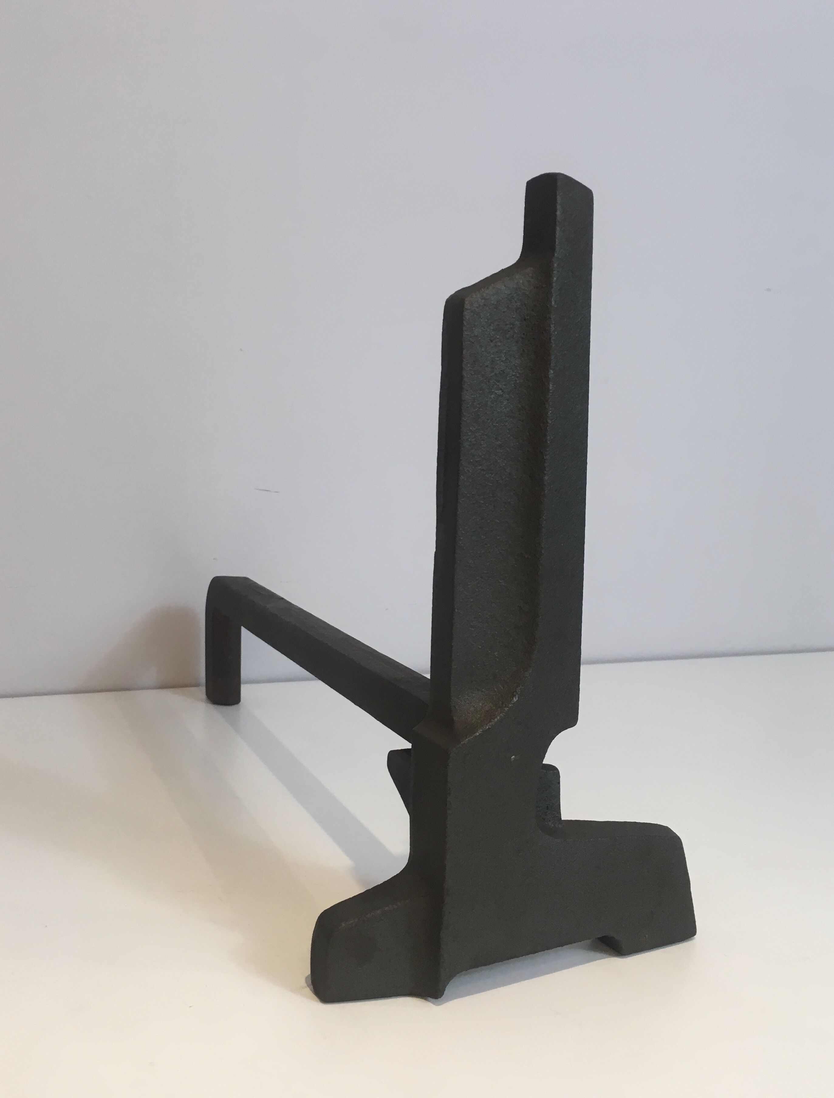 Pair of modernist chenets in cast iron and iron