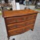 Curved commode in Louis XV style made of cherry wood.