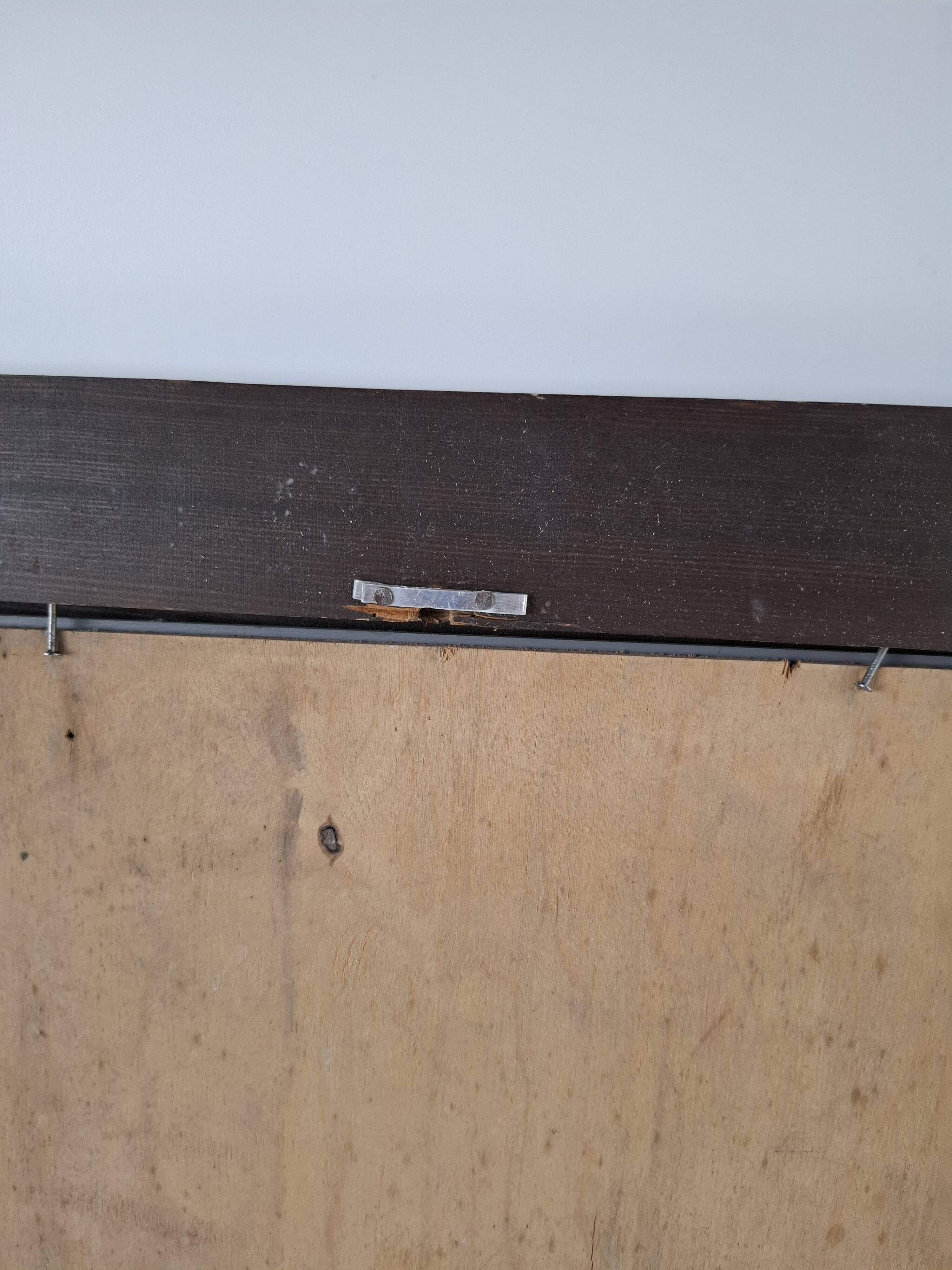 Czechoslovakian wall mirror with a wavy wooden frame, mid-century, 1940s