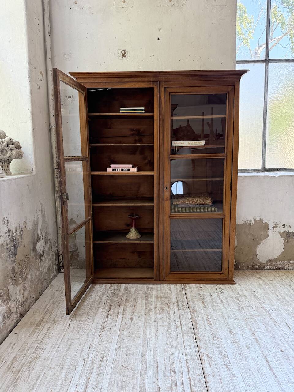 Glass-fronted walnut library 1900