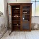 Glass-fronted walnut library 1900