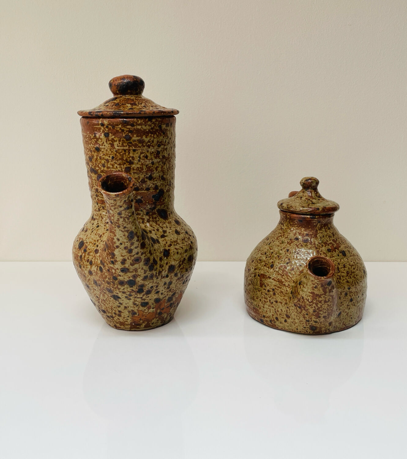 Pair of vintage brutalist ceramic teapots from the 1970s.