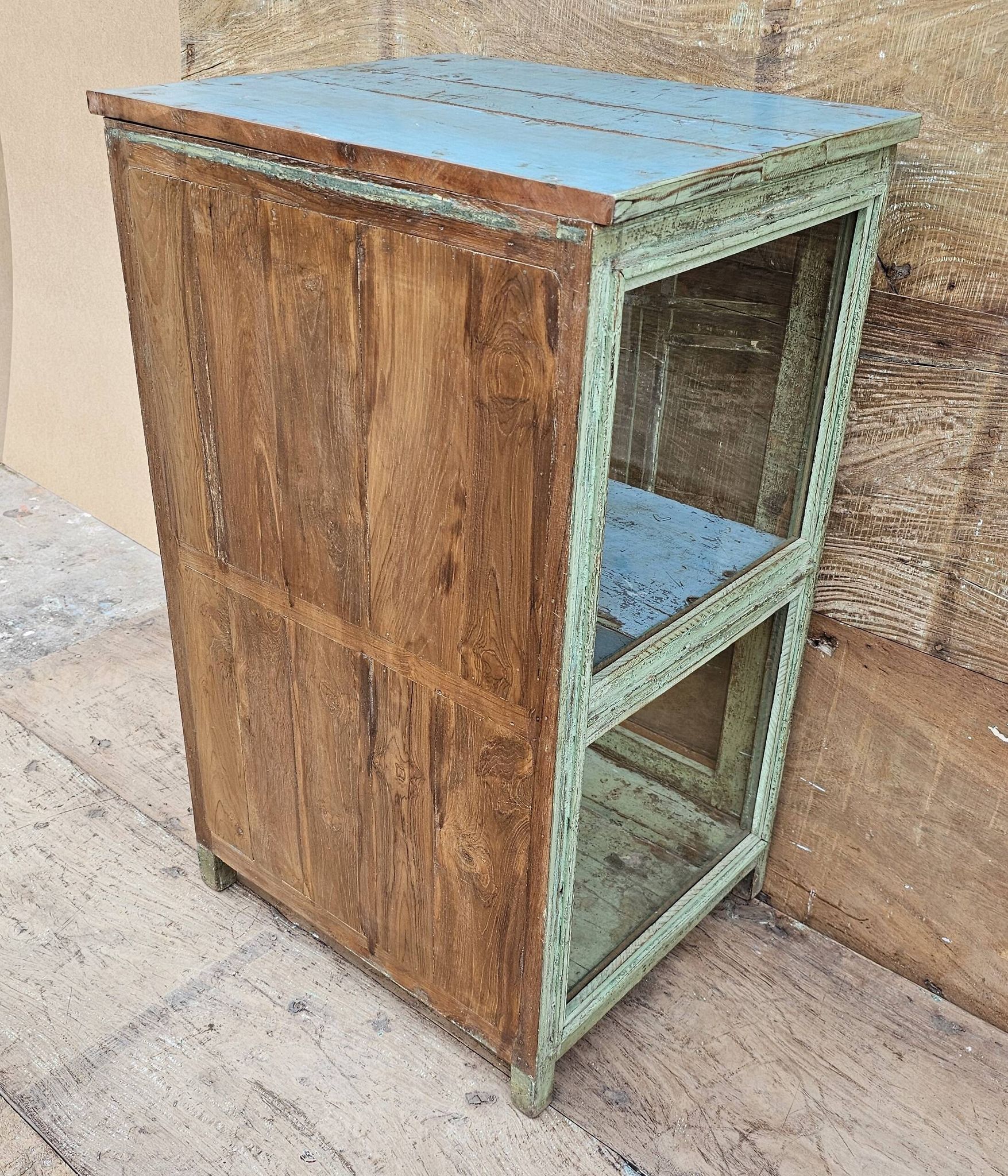 Art Deco glass-fronted bar cabinet in teak