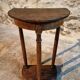 Pair of antique solid wood half-moon side tables, 19th century