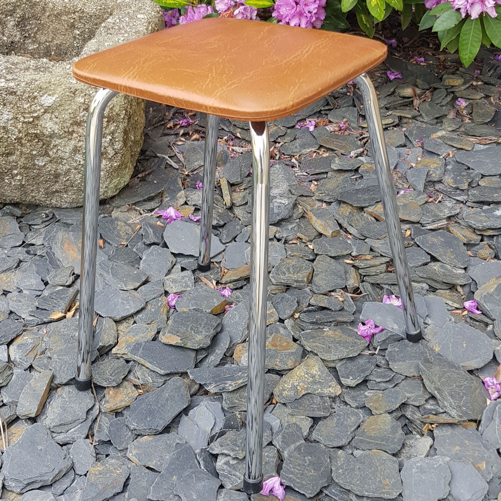 Vintage stool in brown skaï