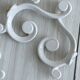 Set of 4 white lacquered metal hooks,