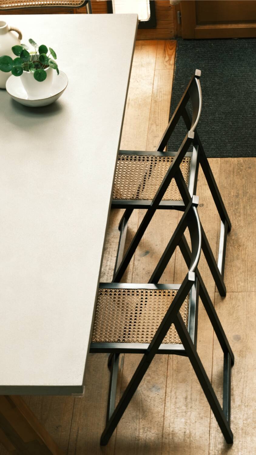 4 black cane folding chairs