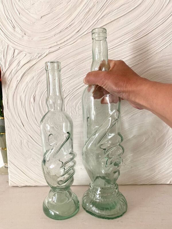 Bouteilles vintage mains Italie