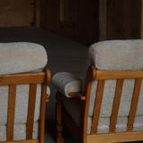 Henning Kjærnulf, lounge chairs in oak and lambswool, mid-century Danish, 1960s.