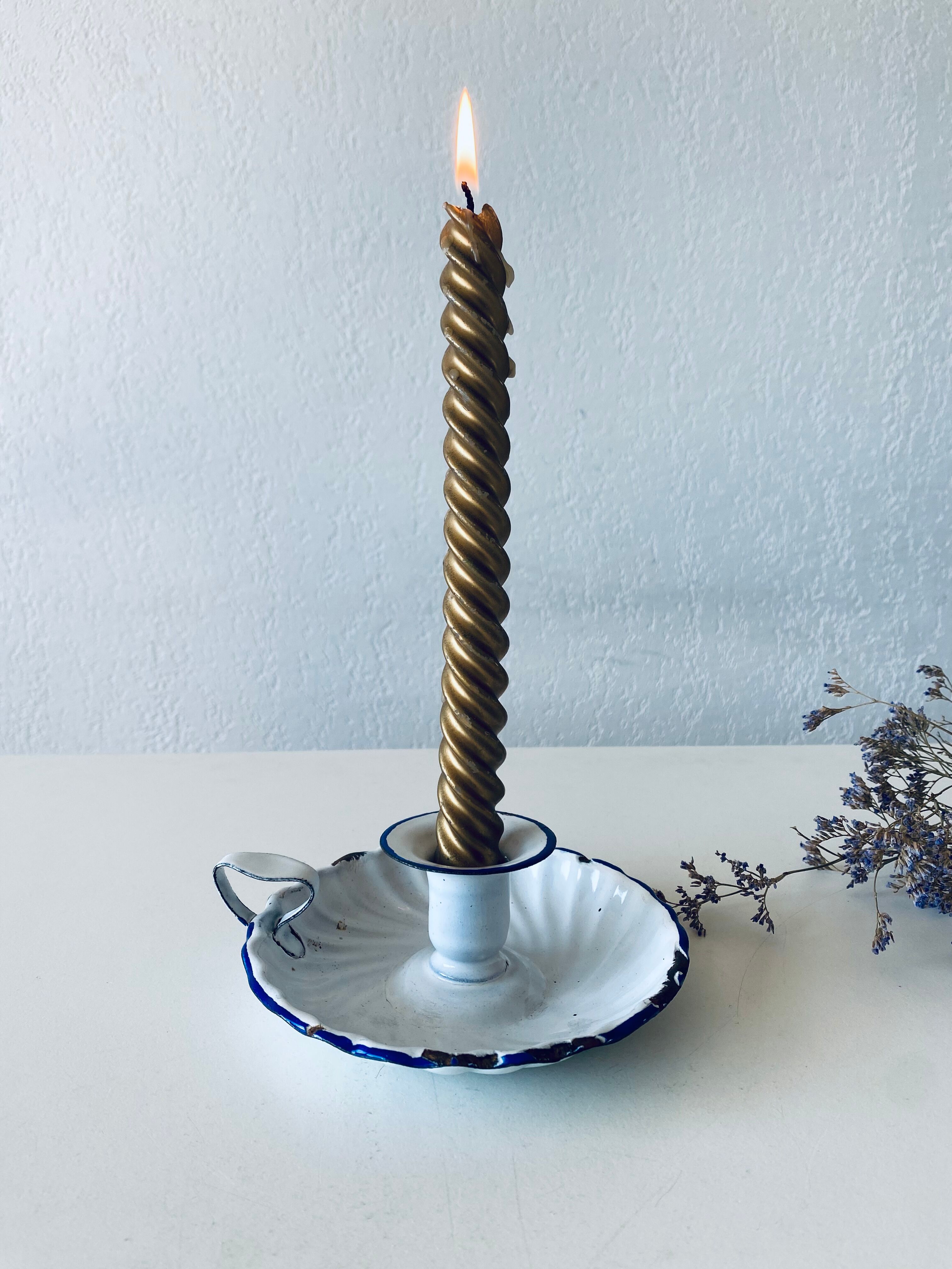 Antique candle holder in white and blue enamelled metal
