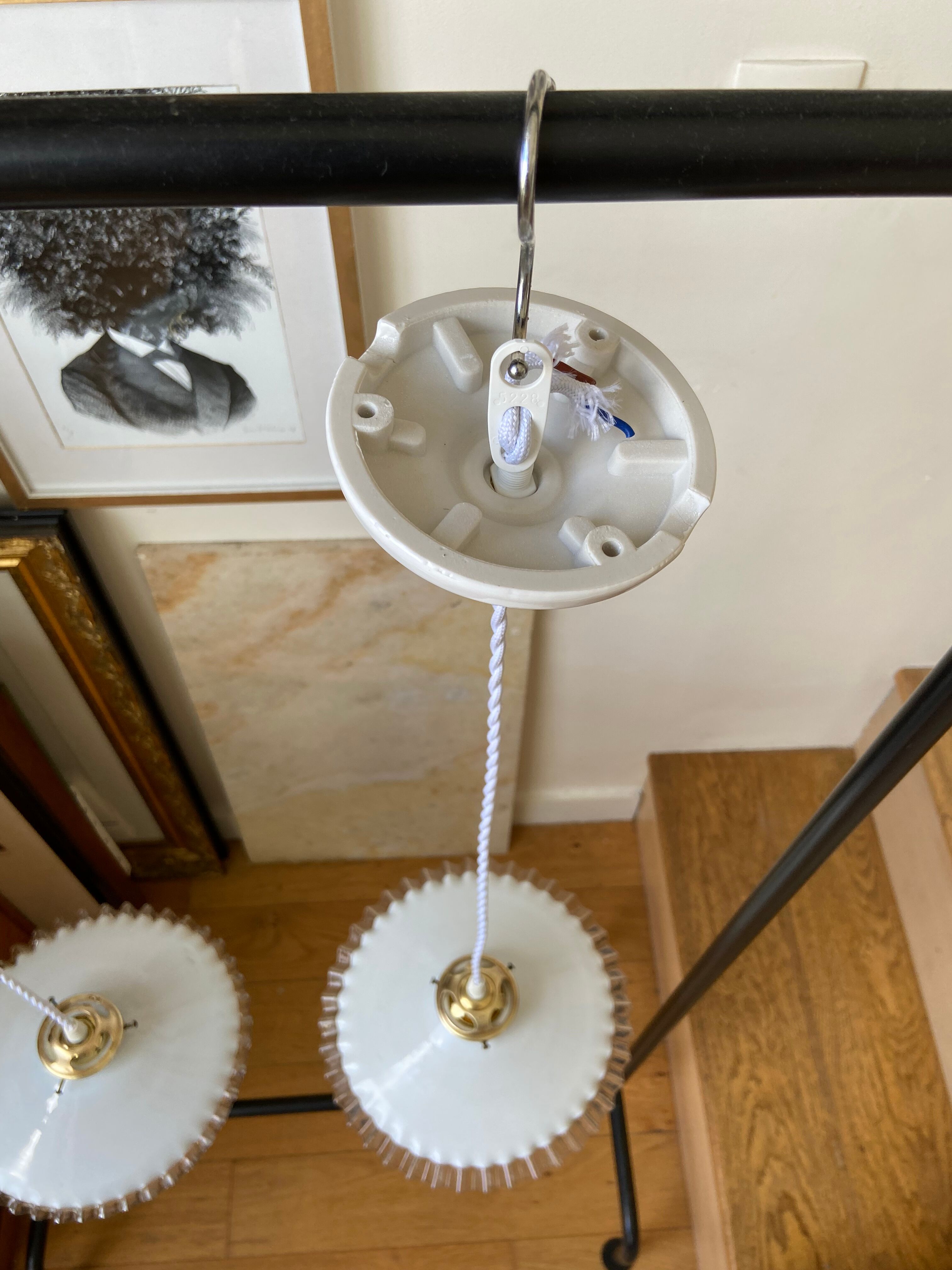 Pair of white glass hanging lamps