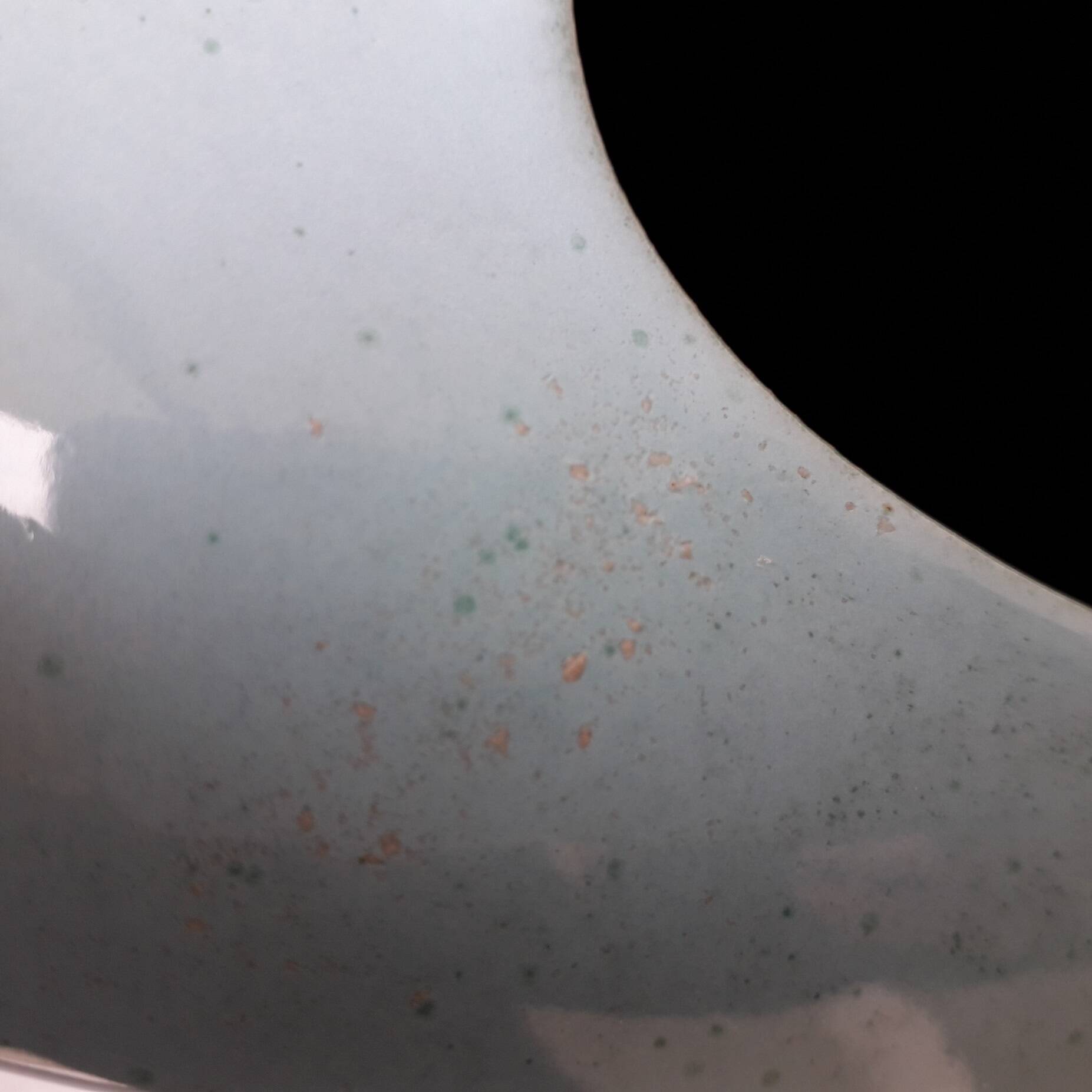 Triangular ceramic vase