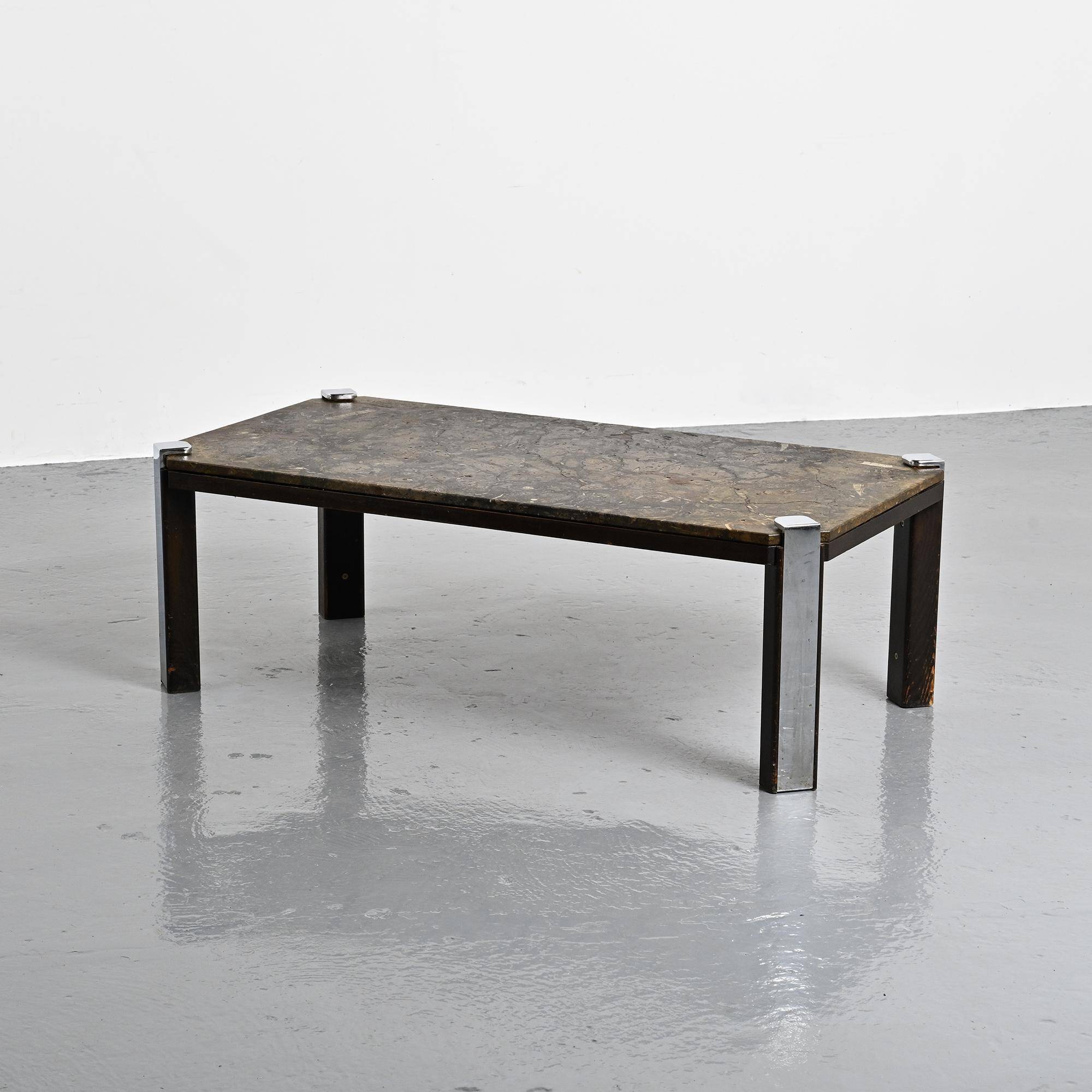 Fossil stone and chrome metal coffee table, Fossile Collection, Switzerland, circa 1980.