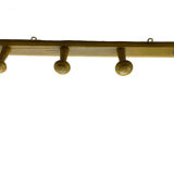 Old yellow wall coat rack