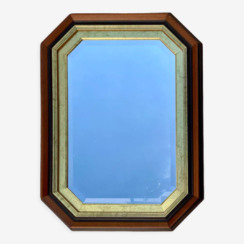 Beveled hexagonal mirror with cut wooden sides, gilded edging decoration