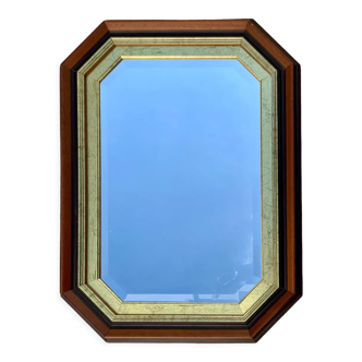 Beveled hexagonal mirror with cut wooden sides, gilded edging decoration