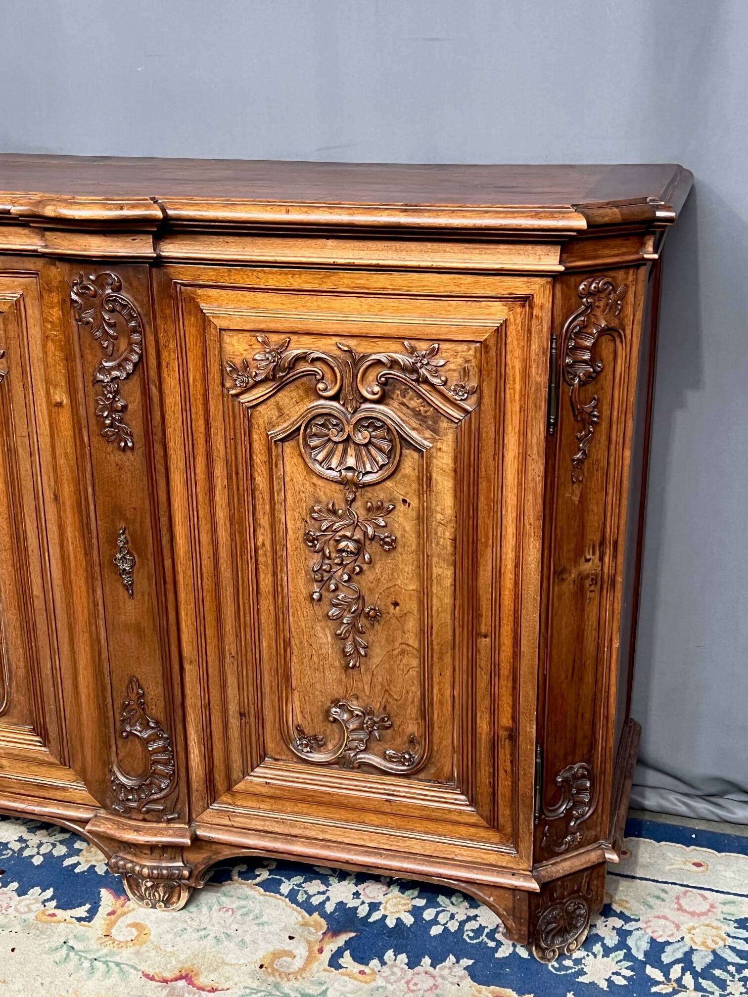 Louis XV style carved walnut chest of drawers