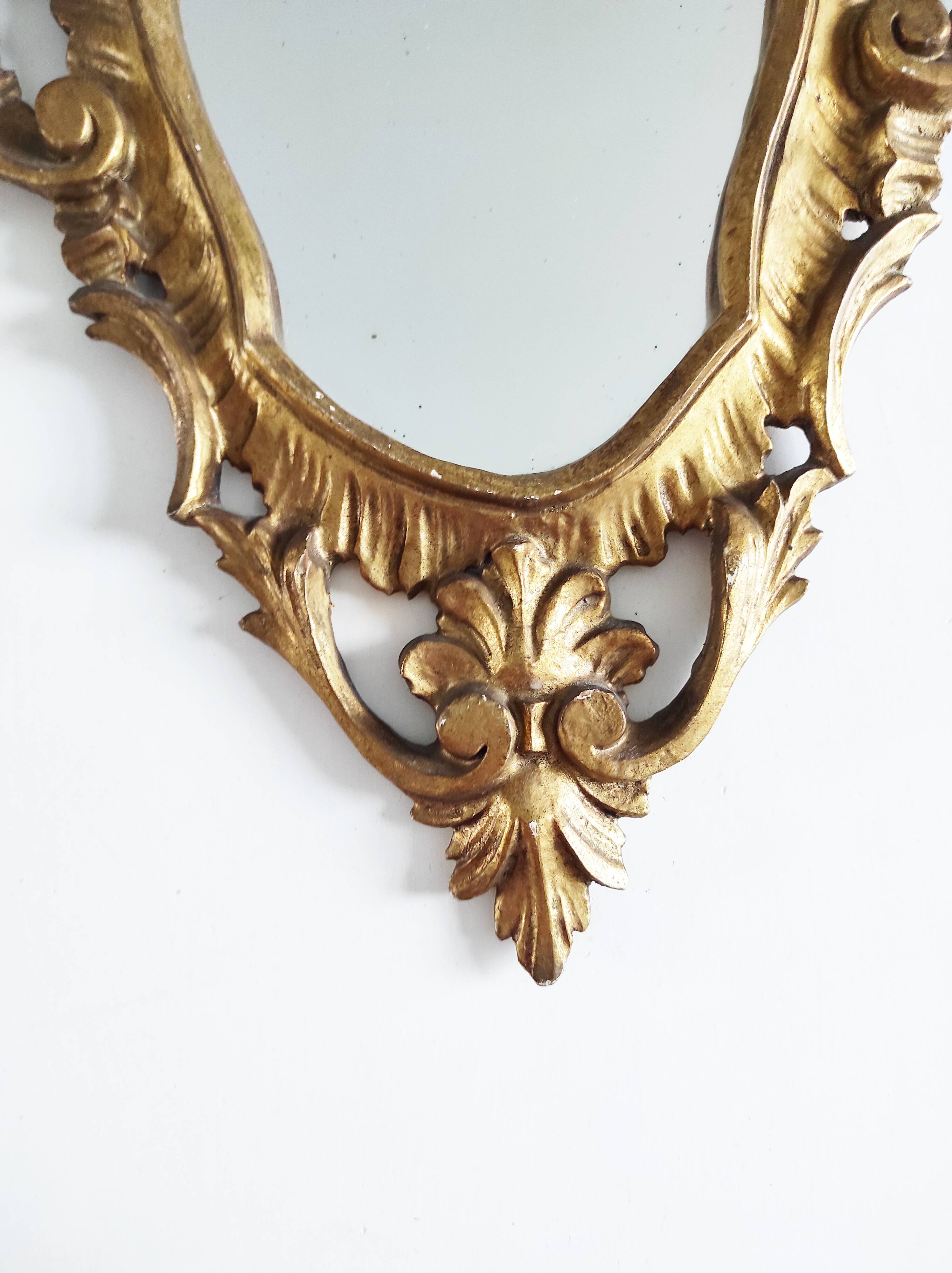 Gilded wood mirror, 56 x 32 cm
