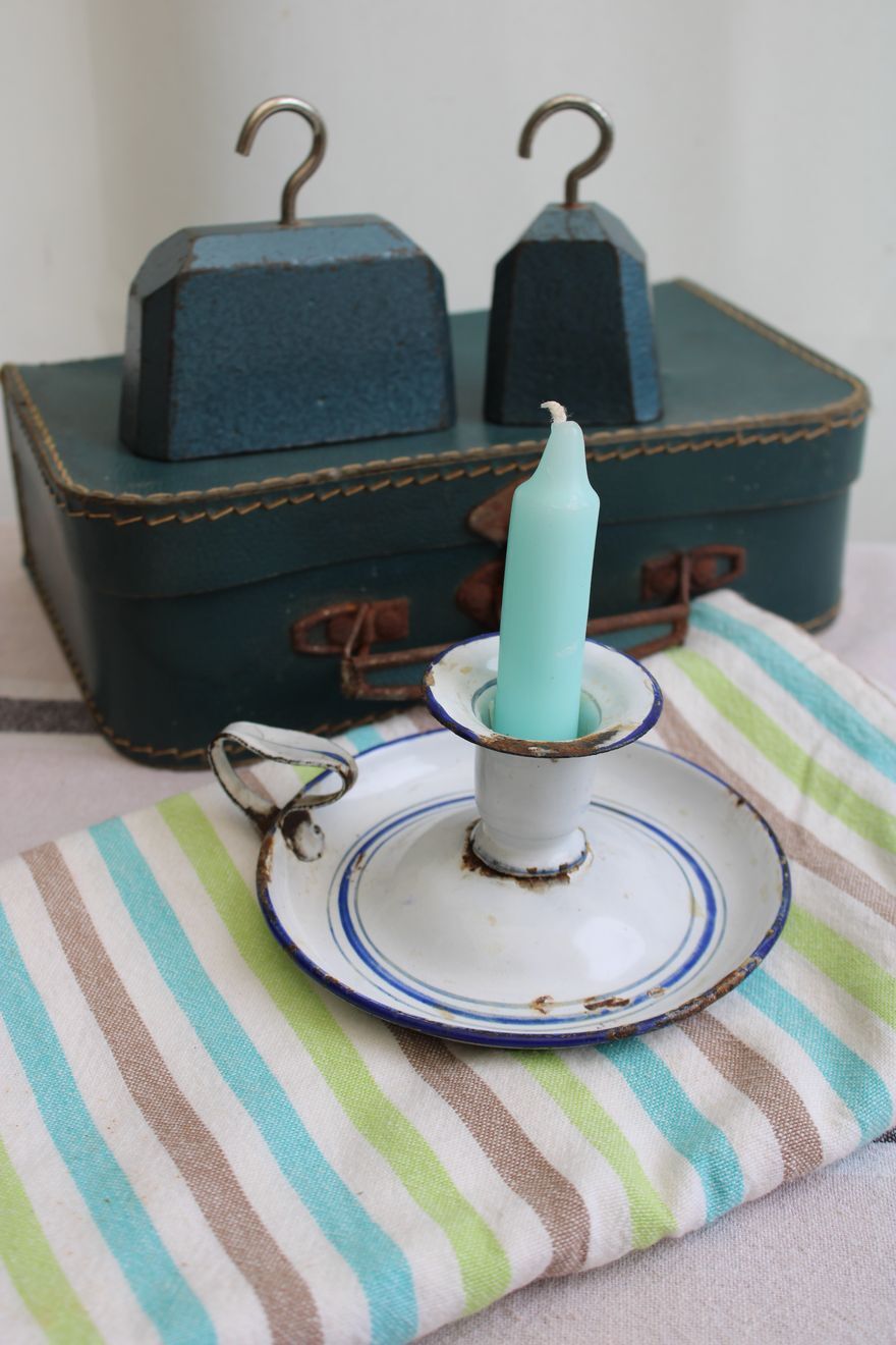 Old enamel candle holder